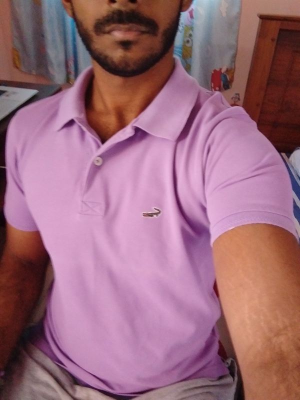 Haritha after, in the same purple polo