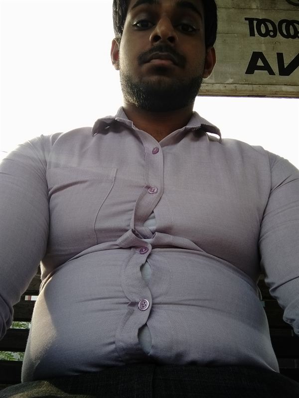 Haritha before, in a tight office shirt